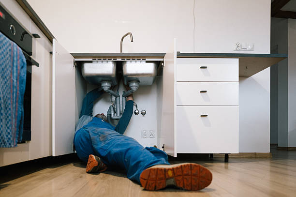 Professional Plumbing technician working in Woodstock, MD